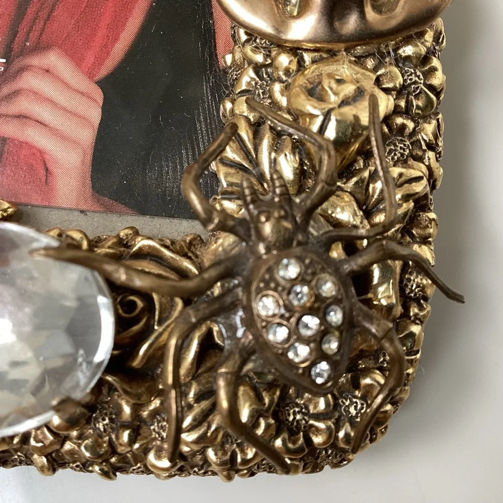 Gold spider and angel jeweled picture frame adorned with charms unique
